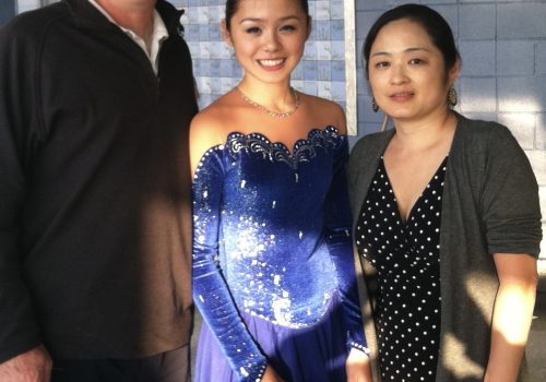 Gregory F Casagrande posing with the USA Solo Ice Dance National Champion, Stephanie L Casagrande and her mother.